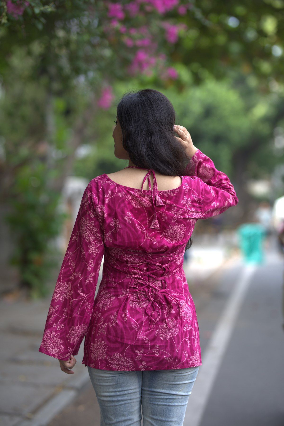 Back view showing the laced corset detail and halter tie